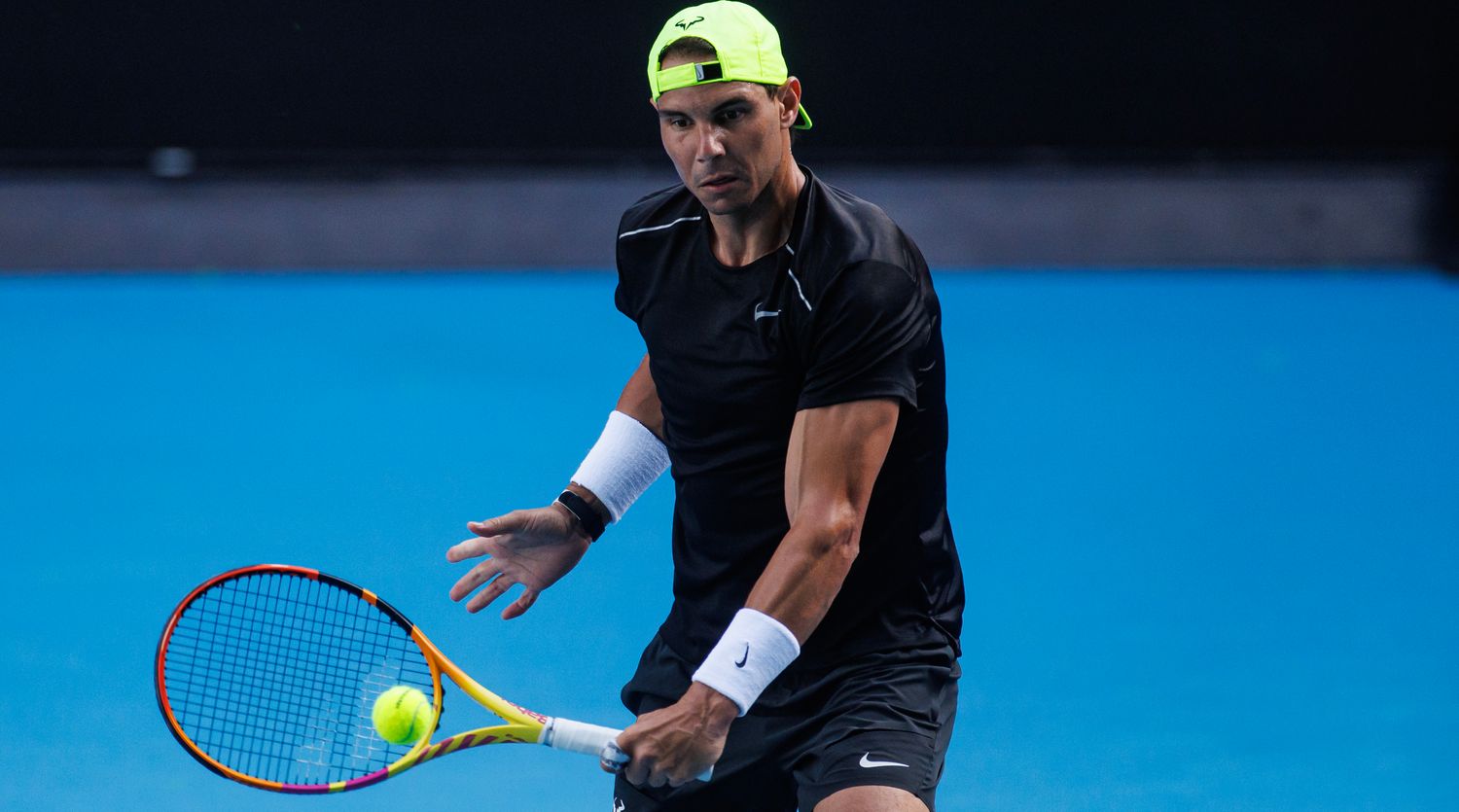 Rafael Nadal of Spain hits a backhand during a practice session at the 2023 Australian Open